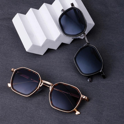 Anteojos de sol Alain Delon, diseño angular metálico, lentes oscuras UV400, estilo elegante para público masculino.