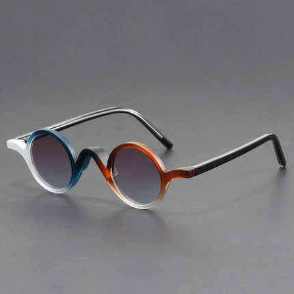 Anteojos de sol retro Warhol redondos de acetato esculpido, colores azules y naranjas, estilo pop para adultos.