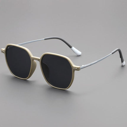 Anteojos de sol unisex de acetato mate sedoso, color beige, con patillas metálicas y lentes UV400 para estilo y protección.