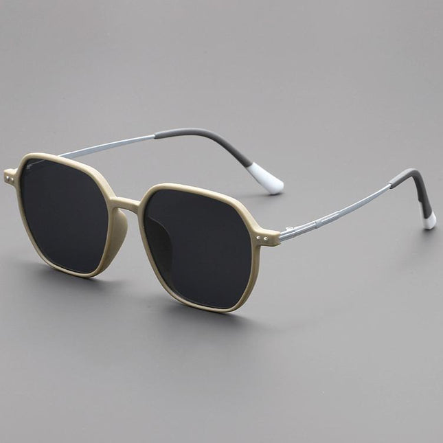 Anteojos de sol unisex de acetato mate sedoso, color beige, con patillas metálicas y lentes UV400 para estilo y protección.