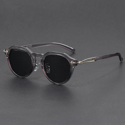 Anteojos de sol vintage Dylan con protección UV400, redondos, lentes oscuros degradé y detalles metálicos para adultos.