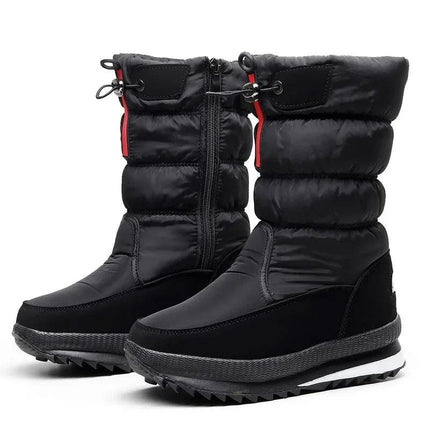 Bota negra impermeable para mujer de piel sintética, ideal para nieve, con cierre y cordones ajustables.