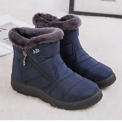 Bota impermeable azul, felpa gris, mujer, diseño moderno y cómodo, ideal invierno, protección nieve, tacón bajo.