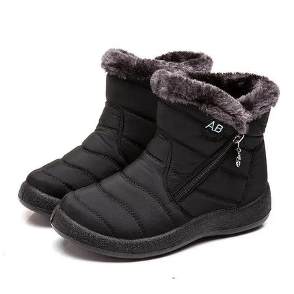 Bota impermeable negra para mujer, con abrigo de felpa suave, diseño moderno ideal para invierno.