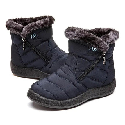 Bota impermeable negra para mujer, con forro de felpa, tacón bajo y diseño moderno, ideal para invierno y nieve.