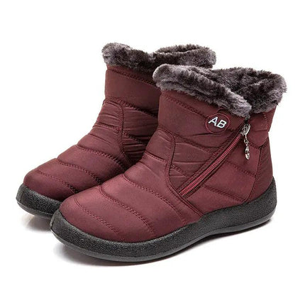 Bota impermeable mujer burdeos, diseño moderno, abrigadas con interior de felpa, ideal para invierno y climas fríos.