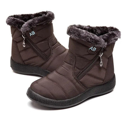 Bota impermeable marrón con felpa para mujer, diseño elegante para invierno, comodidad y estilo en clima frío.