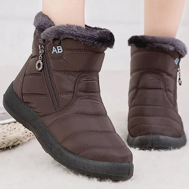 Bota impermeable marrón oscuro, forro interno de felpa, diseño elegante, ideal para invierno, mujer.