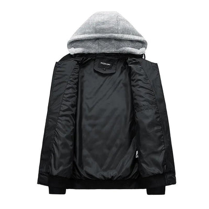 Campera puffer negra con interior relleno de algodón, capucha gris, puños acanalados, ideal para hombres en invierno.