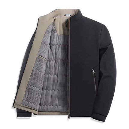 Campera Bomber Boulevard para hombre, color negro, confeccionada en poliéster con interior acolchado gris, diseño moderno.