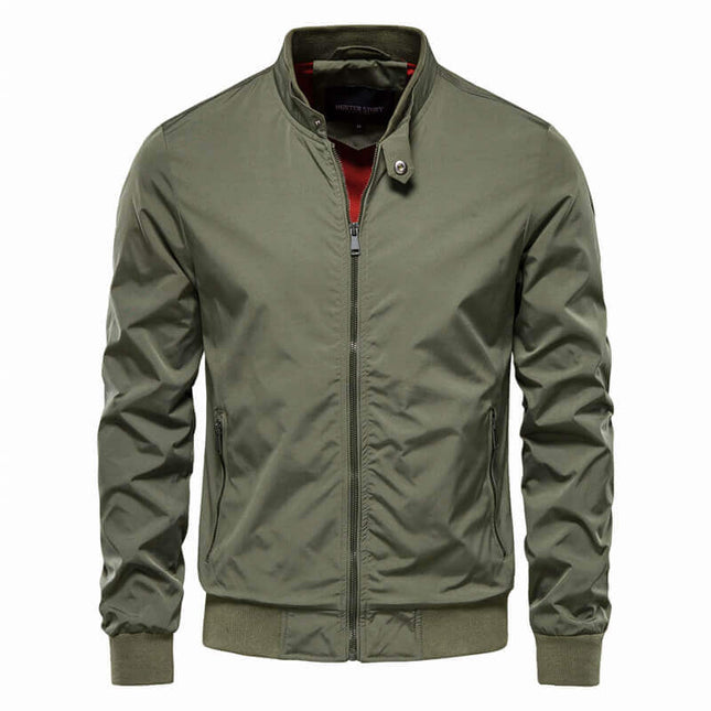 Campera Classic Luxury de nylon y poliéster verde, estilo deportivo retro para hombres, con bolsillos laterales.