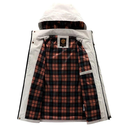 Campera cortavientos impermeable para hombre, con capucha blanca y forro a cuadros, ideal para protección contra el clima.