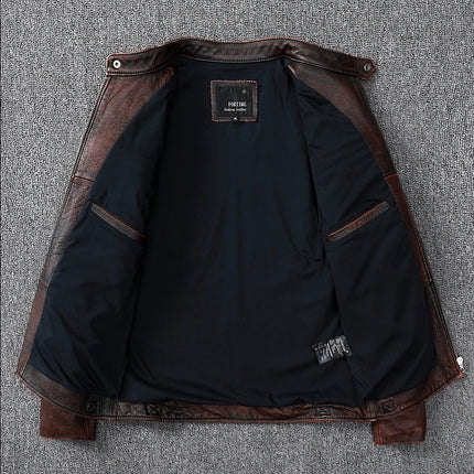 Campera marrón de cuero vacuno 100%, diseñada para hombres, con interior negro acolchonado.