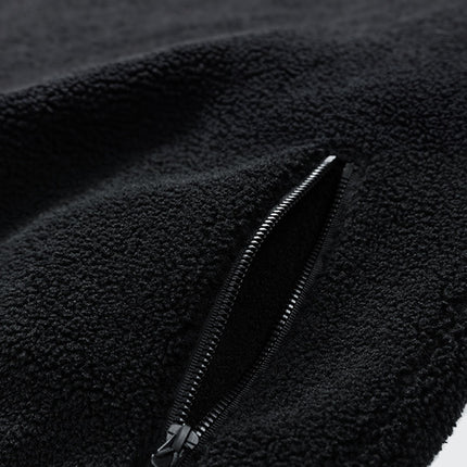 Campera negra Expedition de lana suave con bolsillo con cierre, ideal para el frío. Para actividades al aire libre y casual.