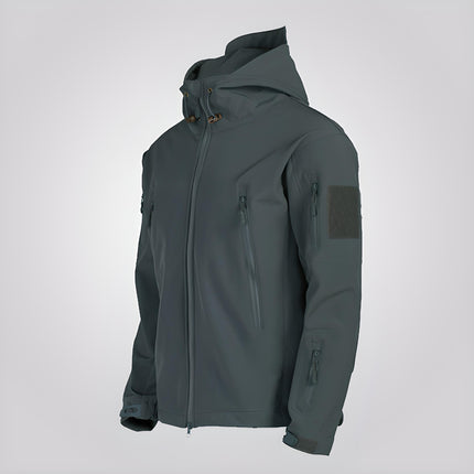 Campera impermeable gris para hombre con interior polar y bolsillos sellados, ideal para climas fríos y outdoor.