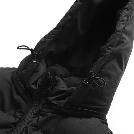 Chaleco ThermoShield negro con capucha desmontable para hombres, ideal para otoño e invierno en Argentina.