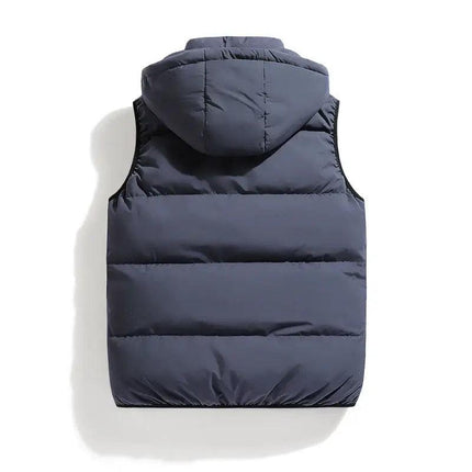 Chaleco ThermoShield azul oscuro sin mangas, relleno grueso, capucha desmontable, ideal para hombres en invierno.