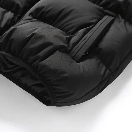 Chaleco ThermoShield sin mangas, negro, relleno grueso para hombres, con capucha desmontable, ideal para el frío.