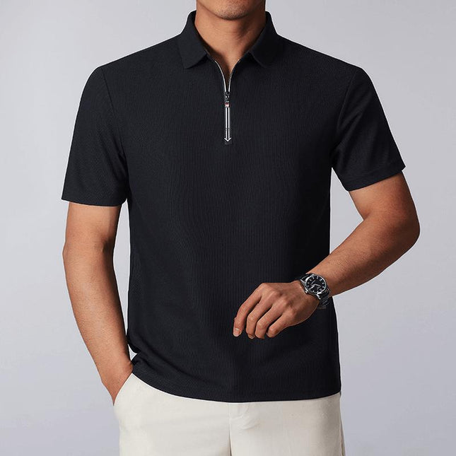 Chomba Julian en algodón negro con cierre quarter-zip, cuello prolijo, ideal para hombres en actividades urbanas y de golf.