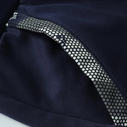 Detalle de bolsillo buzo polar azul marino Frost Peak para hombre con forro interior estilo lana fleece.