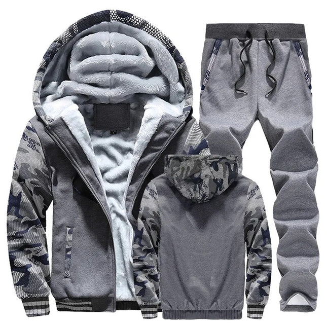 Conjunto polar gris para hombre, buzo con capucha forrada y pantalón, ideal para invierno. Interior tipo lana fleece.
