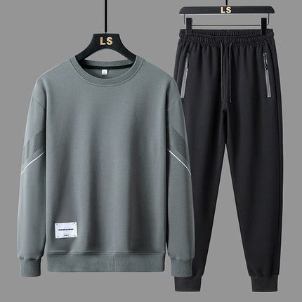 Conjunto Trucker urbano minimalista para hombre, buzo gris y jogger negro, estilo moderno, en talles del S al XXL.