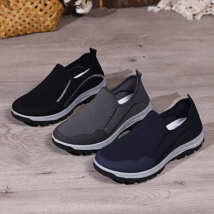 Mocasín Comfort Walk, tejido transpirable, color negro y gris, suela suave y resistente, para uso diario.