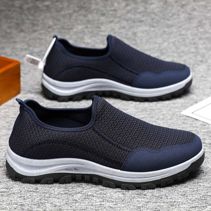 Mocasín color azul marino tejido transpirable para hombres, suela suave y resistente, estilo casual y cómodo.