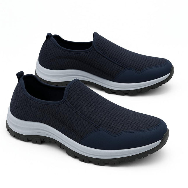 Mocasín azul marino para hombre, tejido transpirable, suela flexible y resistente, ideal para caminar cómodamente.