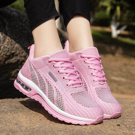 Zapatillas deportivas transpirables rosas para mujeres, con diseño ergonómico y suela anti-impacto, ideales para uso diario.