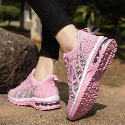 Zapatillas deportivas rosas para mujer, transpirables y ergonómicas, con suela anti-impacto, ideales para uso diario.