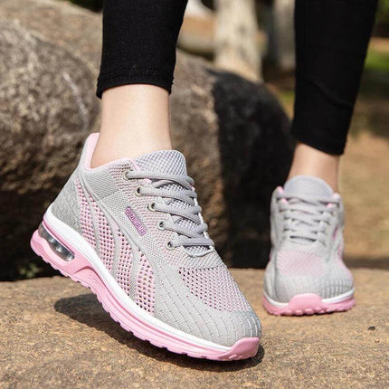 Zapatillas deportivas transpirables gris y rosa para mujer, diseño ergonómico con suela anti-impacto y envío en 24 hrs.