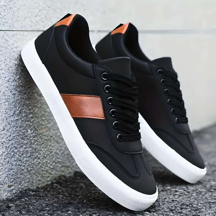 Zapatillas casual de cuero negras con detalle cobre para hombres, estilo elegante y cómodo.