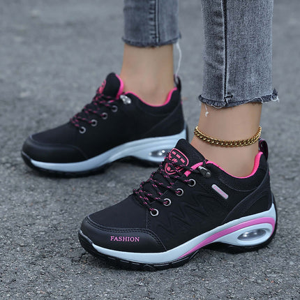 Zapatillas negras ComfortWalk de cuero transpirable, con detalles rosados, para actividades al aire libre, suela con colchón de aire.