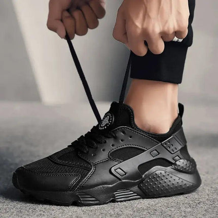 Zapatillas negras para hombre Street Air, livianas y versátiles, ideales para uso urbano y cotidiano.