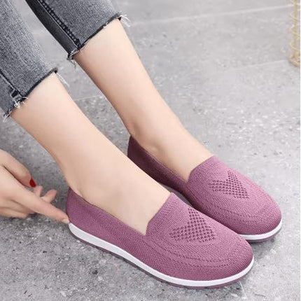 Zapatillas Isabella sin cordones de mujer en color lila, diseño ergonómico con suela antiimpacto ideal para uso diario.