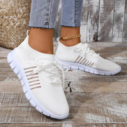 Zapatillas mujer transpirables blancas Zenithi, malla ventilada, suela flexible, diseño ergonómico, calzado cómodo.