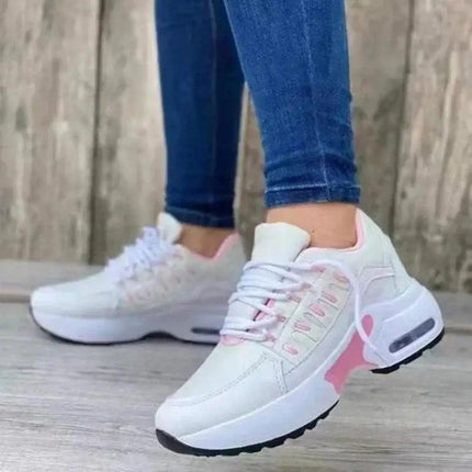Zapatillas Mujer Zenithi Flow blancas con detalles rosados, diseño urbano y ligero, ideal para mujeres activas argentinas.