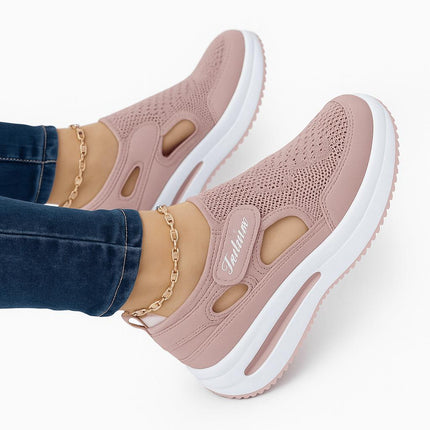 Zapatillas de mujer flexibles color rosa, diseño deportivo, material transpirable con suela blanca, estilo casual.