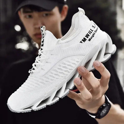 Zapatillas ShockAir Hombre blancas, diseño futurista, materiales sintéticos, ideales para amortiguación y confort diario.