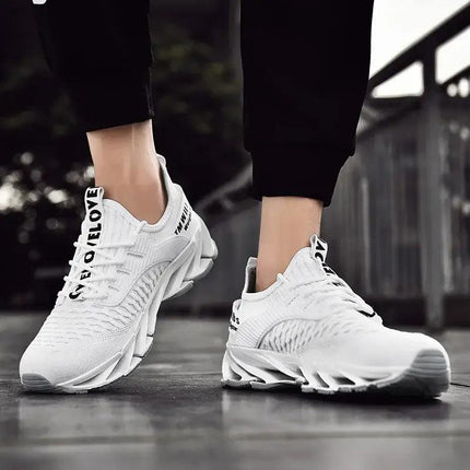Zapatillas ShockAir Hombre blancas de tela, ideales para amortiguación y confort diario.