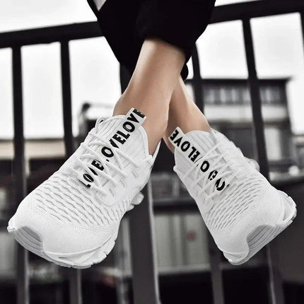 Zapatillas ShockAir para hombre blancas, tejido transpirable, ideales para confort y amortiguación diaria.