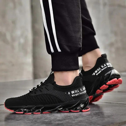 Zapatillas ShockAir para hombre, color negro con suela roja, diseño ergonómico para amortiguación y confort diario.