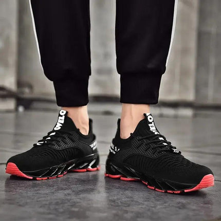 Zapatillas ShockAir para hombre en color negro y rojo con amortiguación, ideales para confort diario.