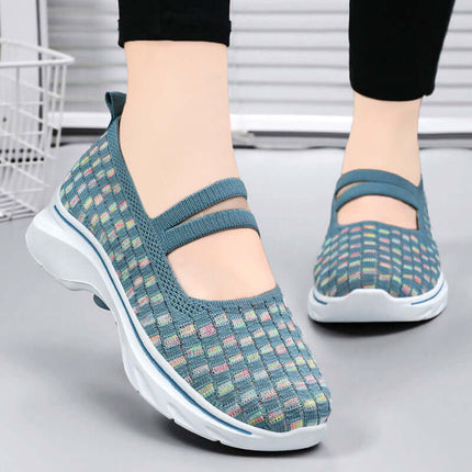 Zapatillas transpirables Flyknit azul, bloques de color, mujer, suela antideslizante, diseño cómodo y moderno.