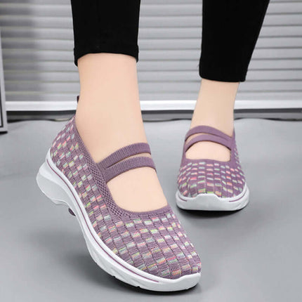 Zapatillas transpirables color lila con bloques de color, suela antideslizante y ajuste cómodo para mujer.