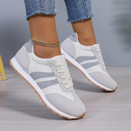 Zapatillas deportivas de tela blanca y gris para mujer, transpirables y modernas.