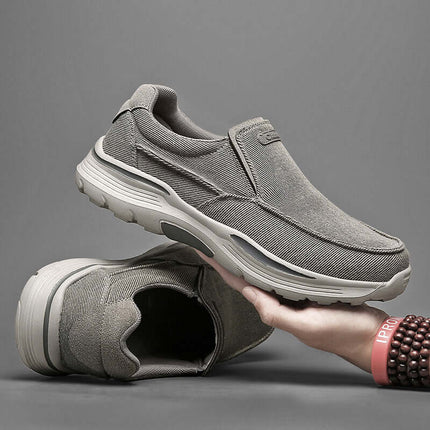 Zapatos de lona gris sin cordones para hombres, cómodos y antideslizantes, ideales para uso diario en Argentina.