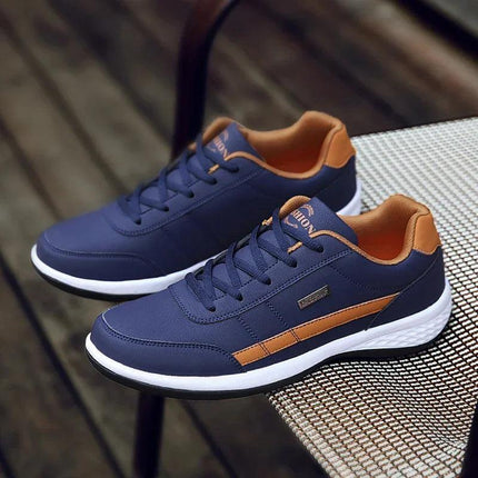 Zapatos impermeables azules y marrones para hombre, estilo diario, con suela antideslizante y diseño moderno.