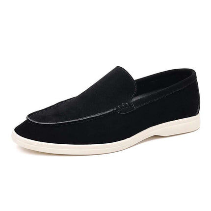 Zapato informal sin cordones de hombre, color negro, suela blanca, diseño moderno y cómodo, ideal para uso diario.